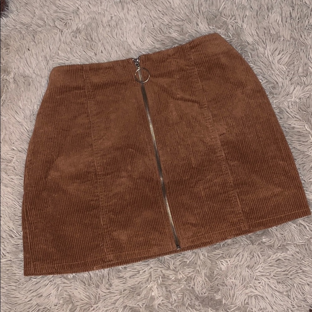 Rust/ burnt orange colored skirt